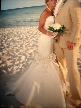 A Designer Original Cream Satin Bridal Gown